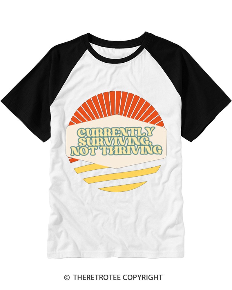 TheRetroTee Currently Surviving Not Thriving Raglan Baseball T-Shirt