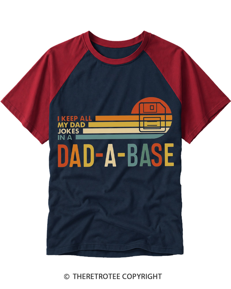 TheRetroTee I Keep All My Dad Jokes In A Dad-a-base 1970s Raglan Baseball T-Shirt