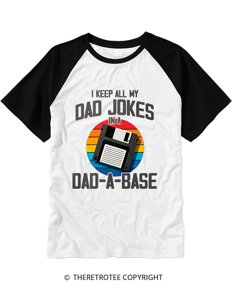 TheRetroTee I Keep All My Dad Jokes In A Dad-A-Base  1980s Raglan Baseball T-Shirt