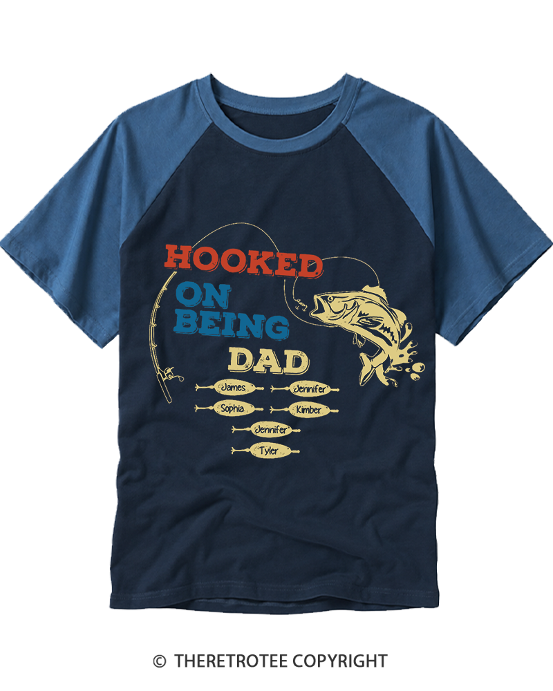 TheRetroTee Hooked On Being Dad 1980s Raglan Baseball T-Shirt