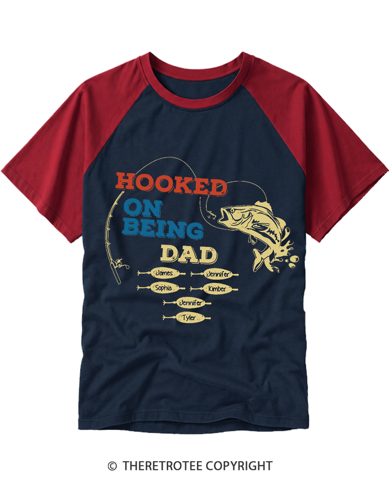 TheRetroTee Hooked On Being Dad 1980s Raglan Baseball T-Shirt