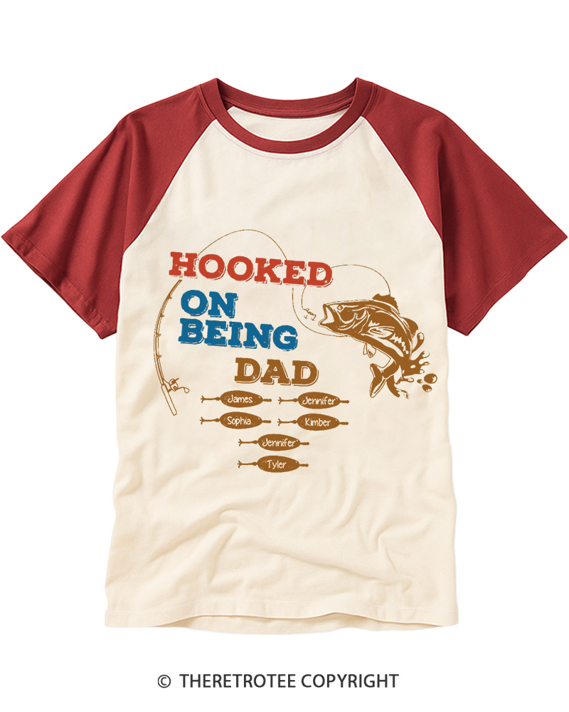 TheRetroTee Hooked On Being Dad 1980s Raglan Baseball T-Shirt