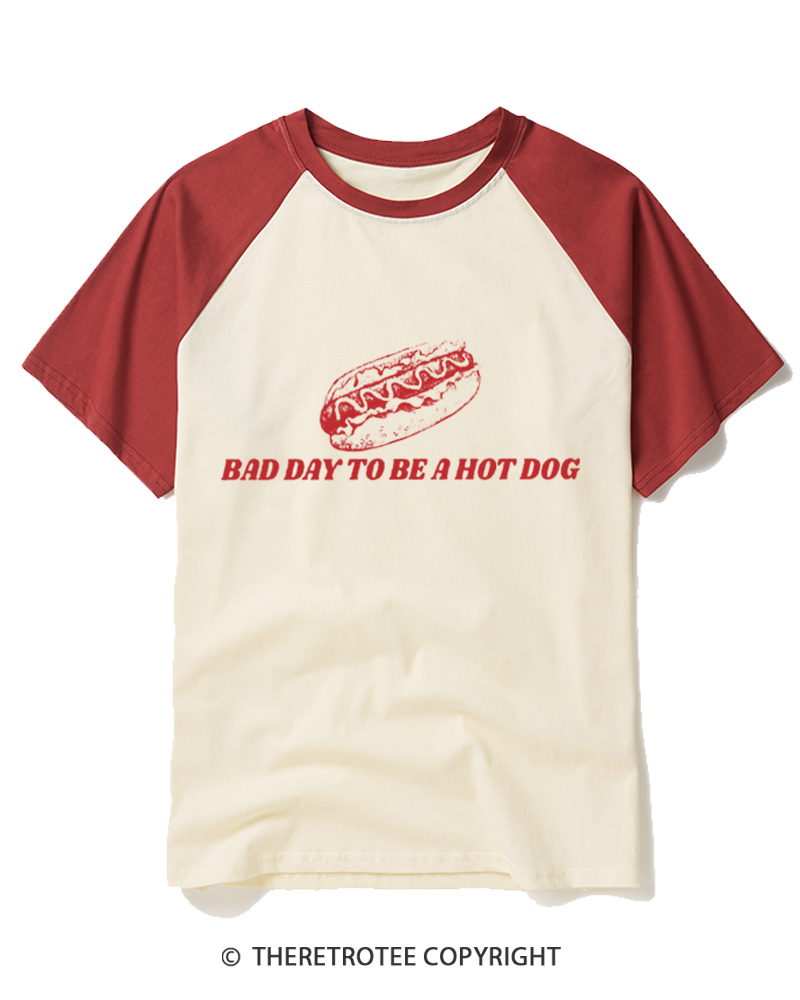 TheRetroTee Bad Day To Be A Hot Dog 1776 Raglan Baseball T-Shirt