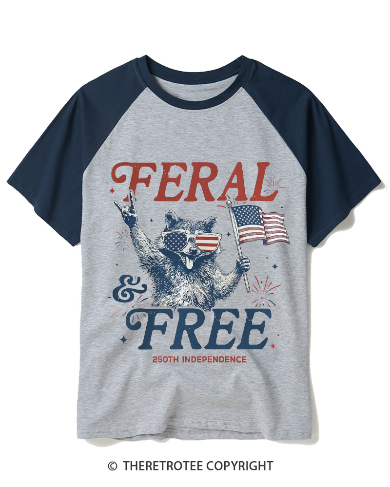 TheRetroTee Feral & Free Funny Raccoon 1776 Raglan Baseball T-Shirt