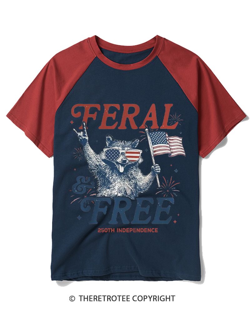 TheRetroTee Feral & Free Funny Raccoon 1776 Raglan Baseball T-Shirt