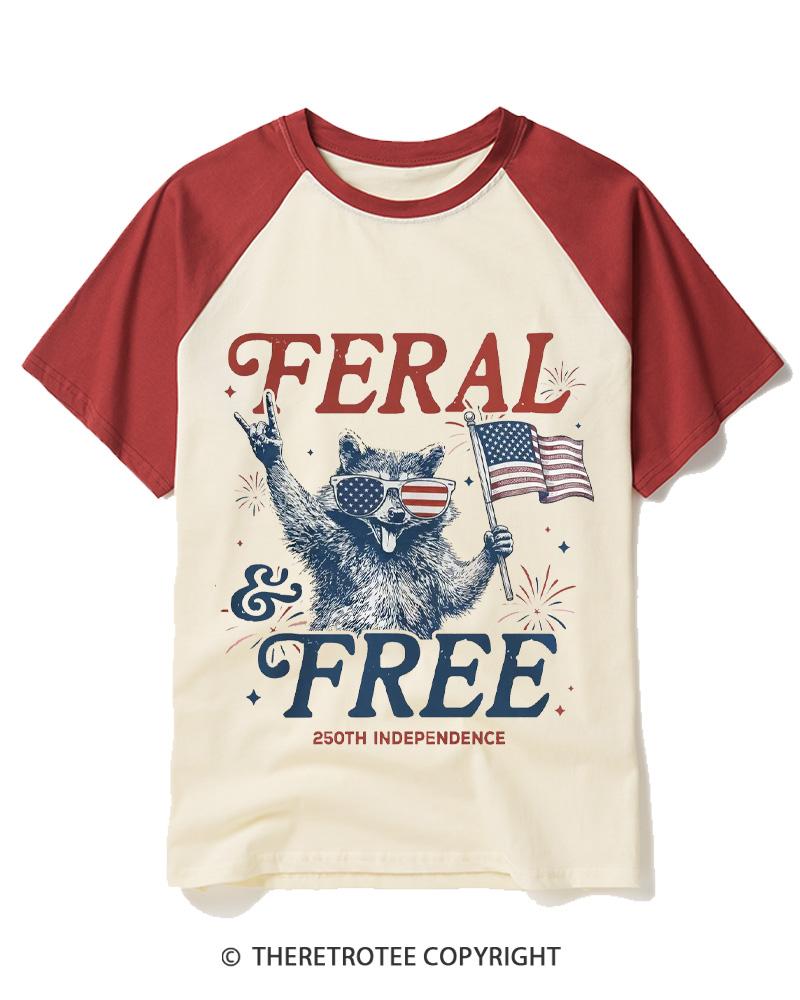 TheRetroTee Feral & Free Funny Raccoon 1776 Raglan Baseball T-Shirt