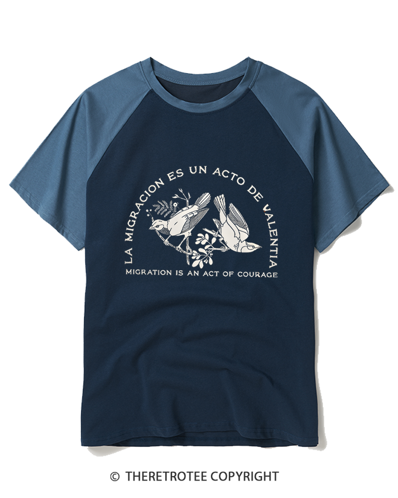 TheRetroTee La Migración Es Un Acto De Valentía Raglan Baseball T-Shirt