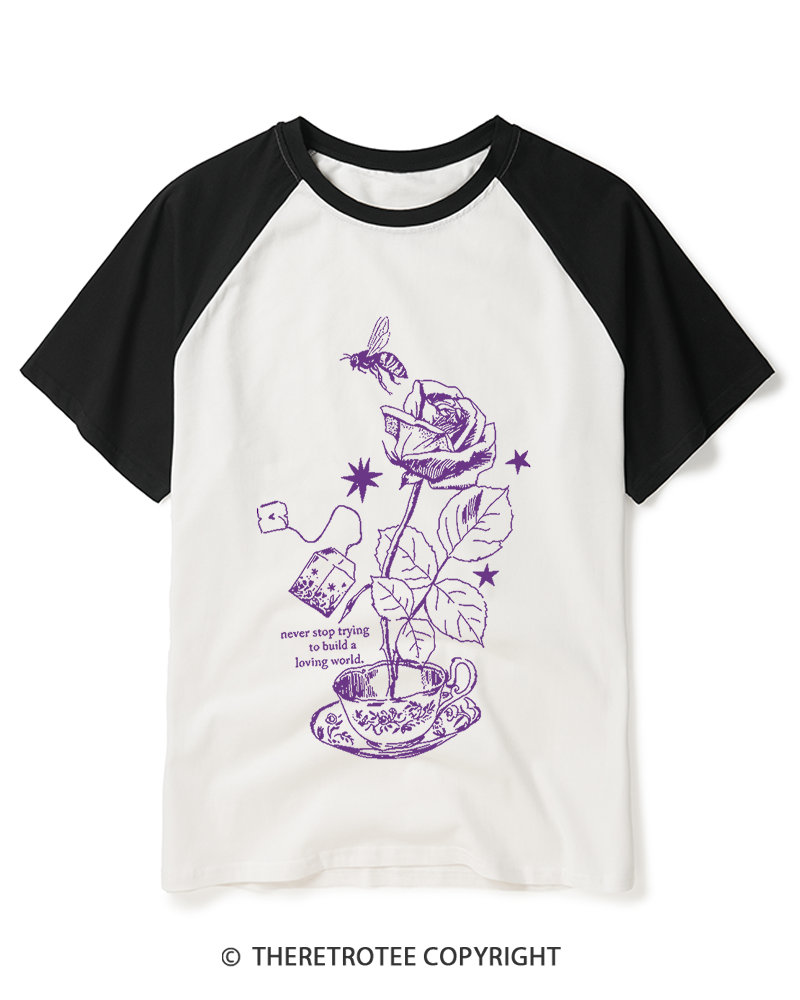 TheRetroTee Never Stop Trying To Build A Loving World 1980s Raglan Baseball T-Shirt