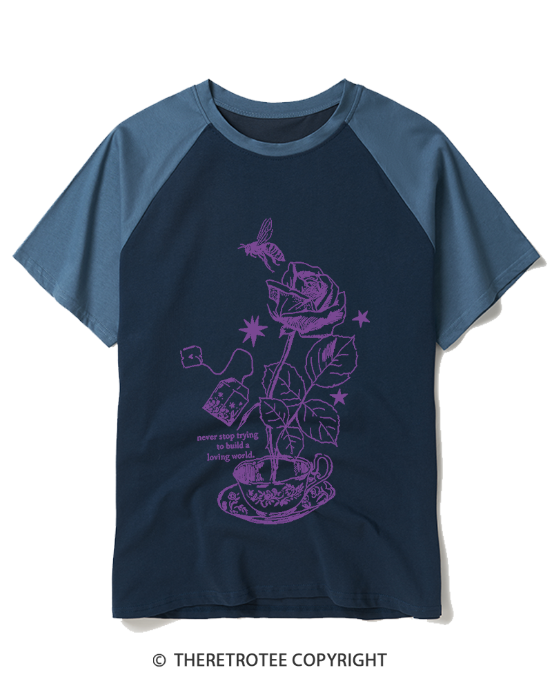 TheRetroTee Never Stop Trying To Build A Loving World 1980s Raglan Baseball T-Shirt