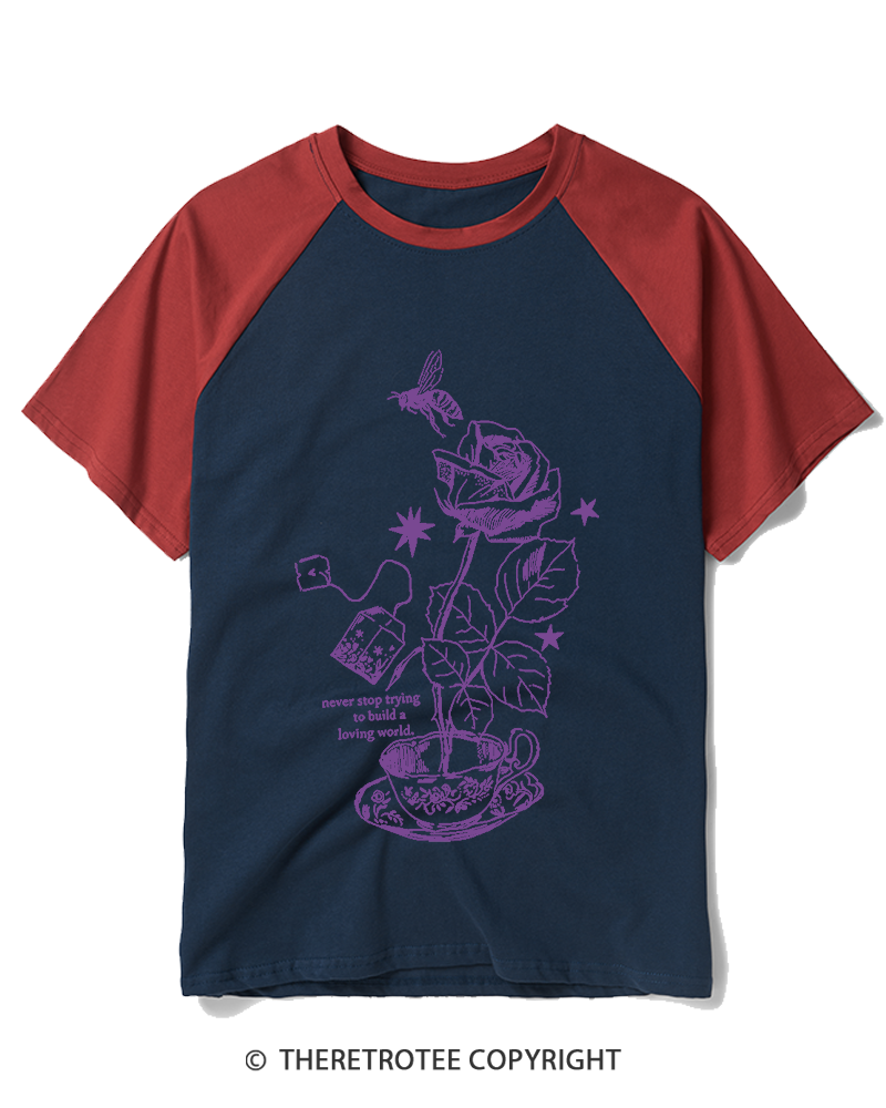 TheRetroTee Never Stop Trying To Build A Loving World 1980s Raglan Baseball T-Shirt
