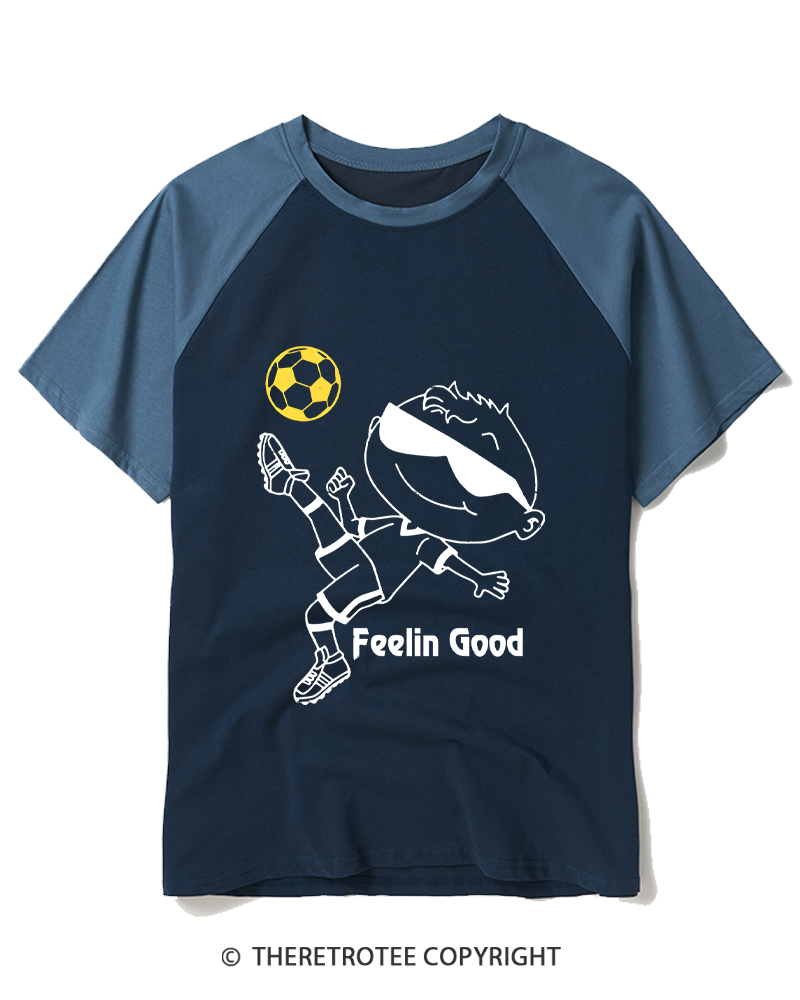 TheRetroTee Soccer Player Graphic 1990s Raglan Baseball T-Shirt