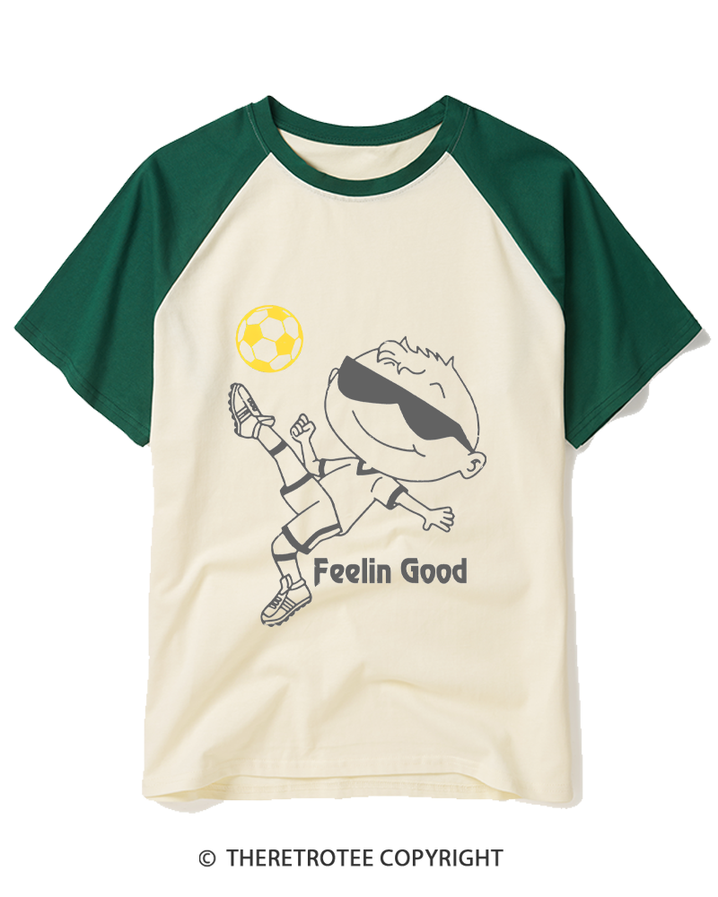 TheRetroTee Soccer Player Graphic 1990s Raglan Baseball T-Shirt