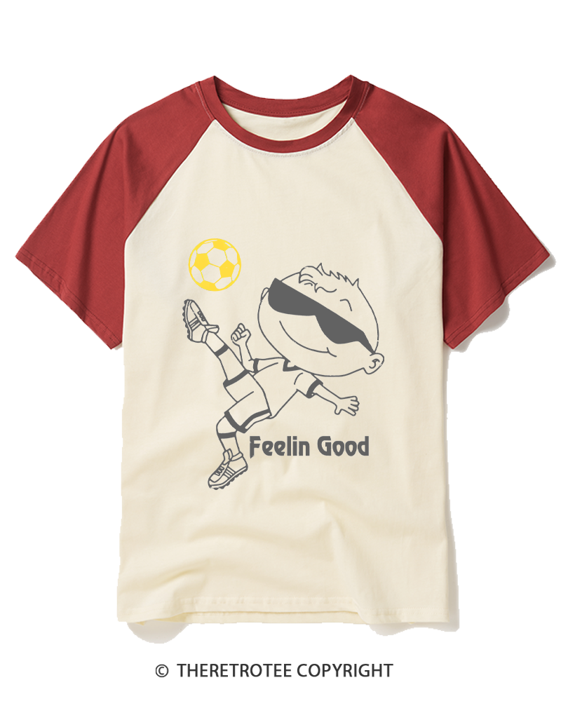 TheRetroTee Soccer Player Graphic 1990s Raglan Baseball T-Shirt