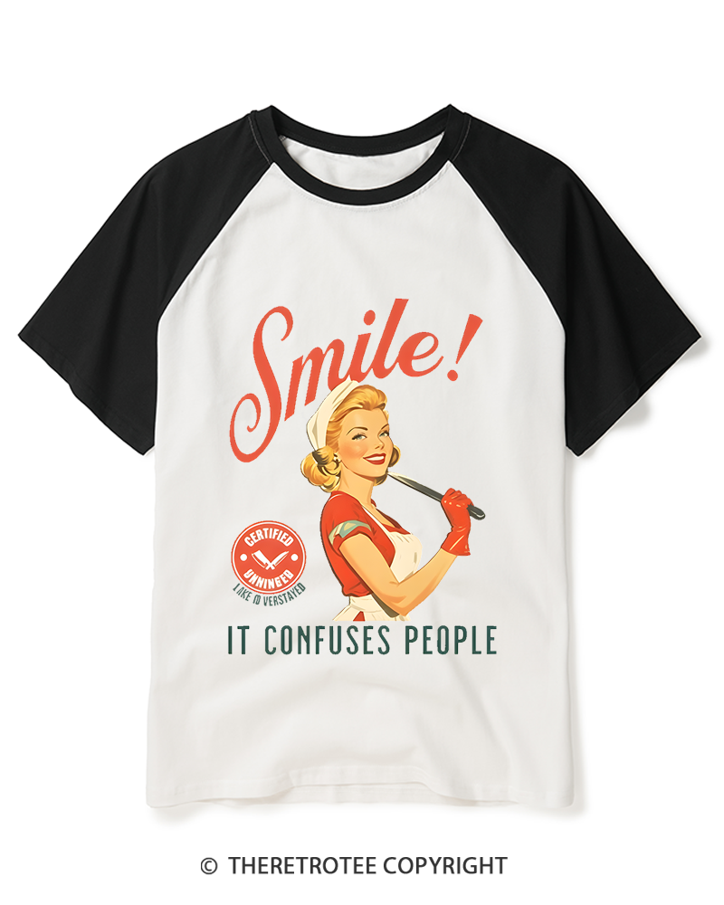 TheRetroTee Smile! It Confuses People 1950s Raglan Baseball T-Shirt
