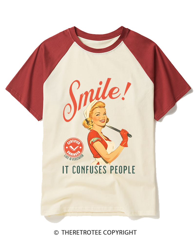 TheRetroTee Smile! It Confuses People 1950s Raglan Baseball T-Shirt