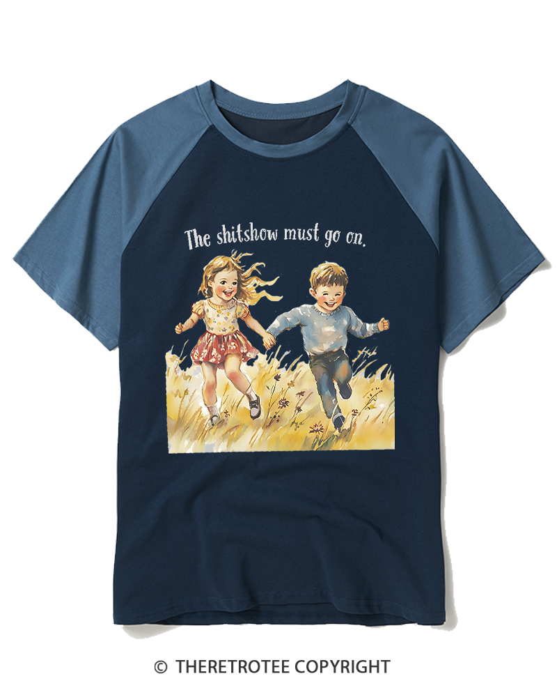 TheRetroTee The Shitshow Must Go On 1950s Raglan Baseball T-Shirt