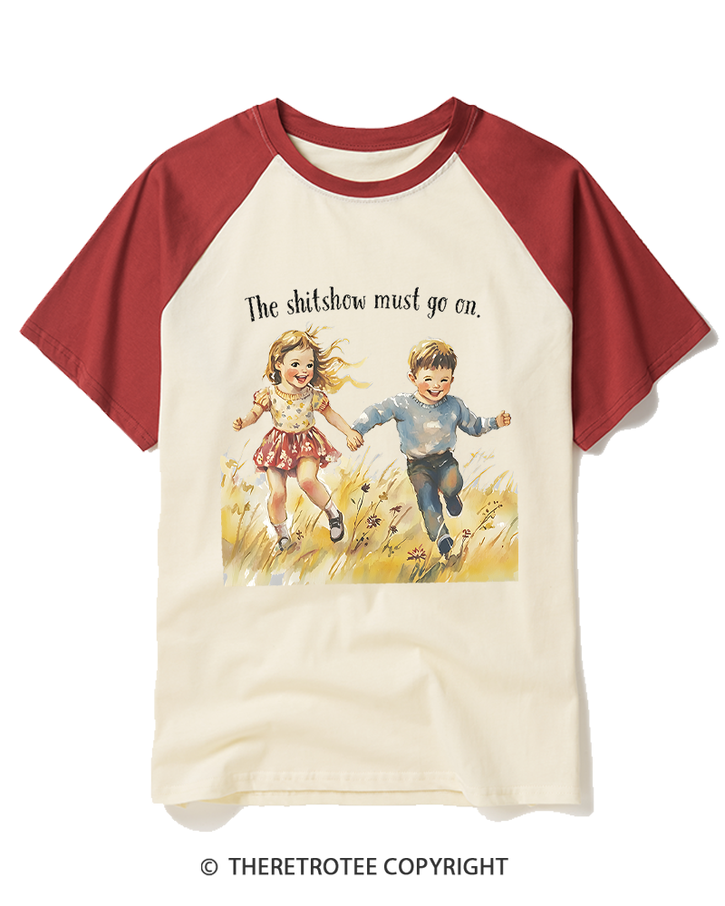 TheRetroTee The Shitshow Must Go On 1950s Raglan Baseball T-Shirt
