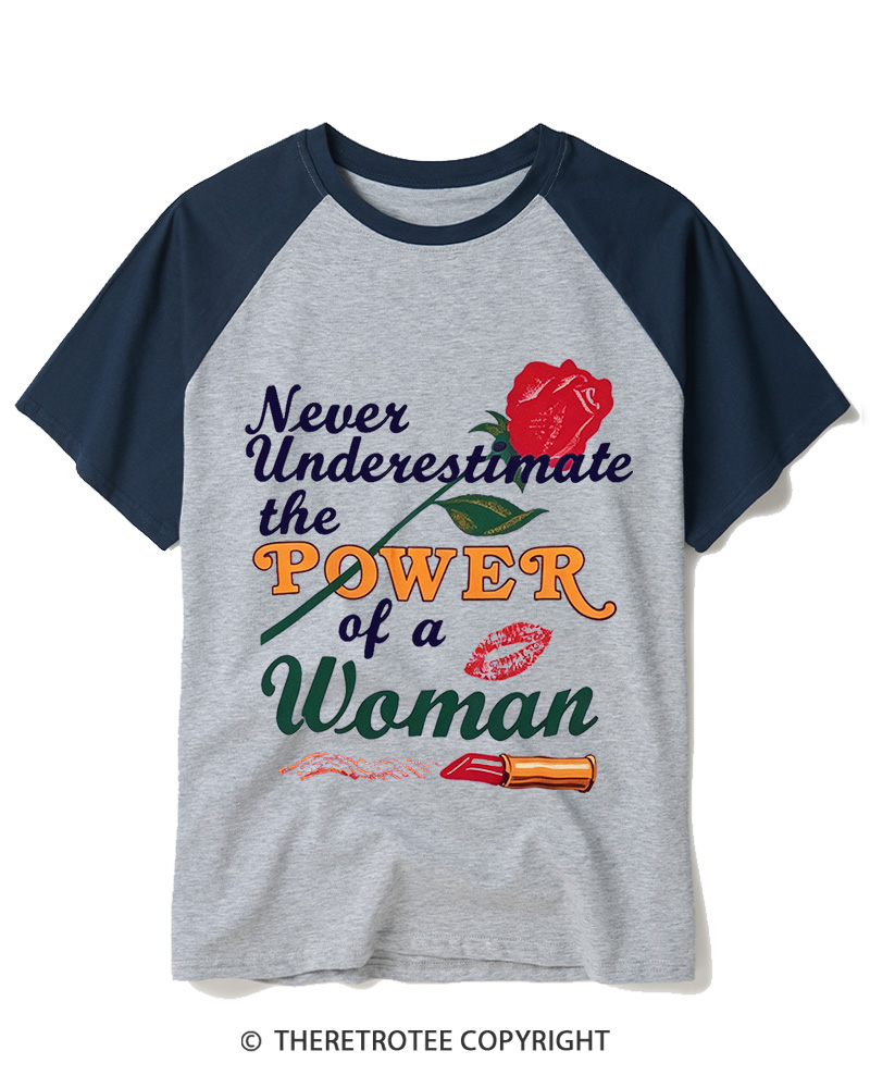 TheRetroTee Never Underestimate The Power Of A Woman 1970s Raglan Baseball T-Shirt