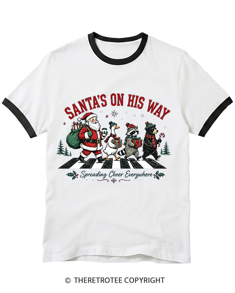 TheRetroTee Santa’s On His Way 1960s Christmas Ringer T-shirt
