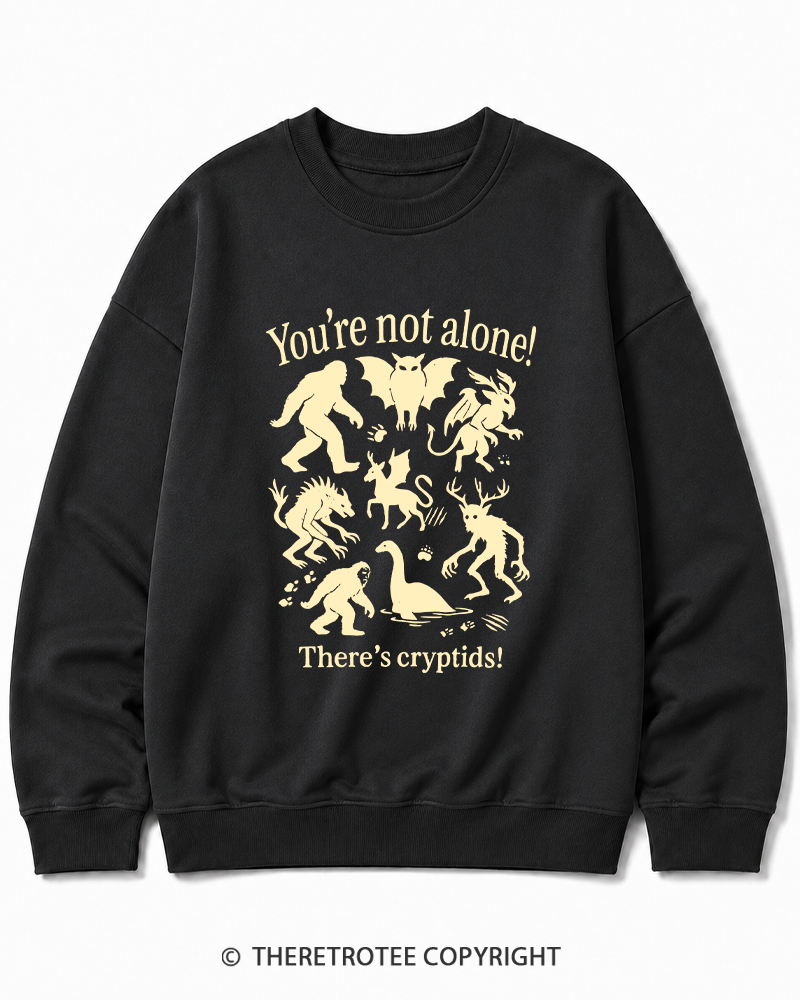 TheRetroTee Cryptid 1970s Halloween Cotton Sweatshirt