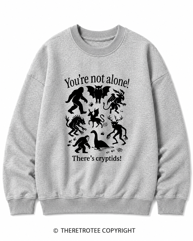 TheRetroTee Cryptid 1970s Halloween Cotton Sweatshirt