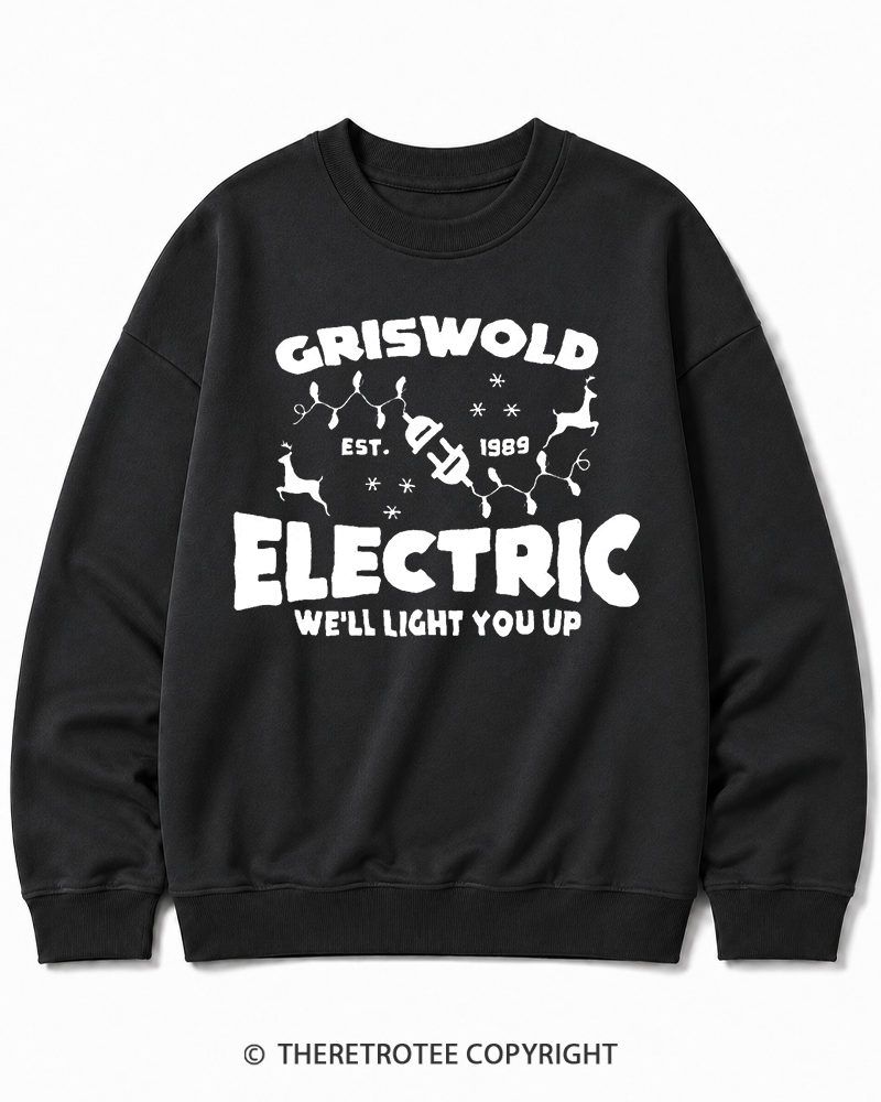 TheRetroTee We’ll Light You Up 1980s Christmas Cotton Sweatshirt
