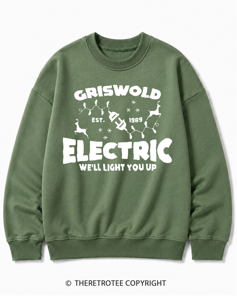 TheRetroTee We’ll Light You Up 1980s Christmas Cotton Sweatshirt