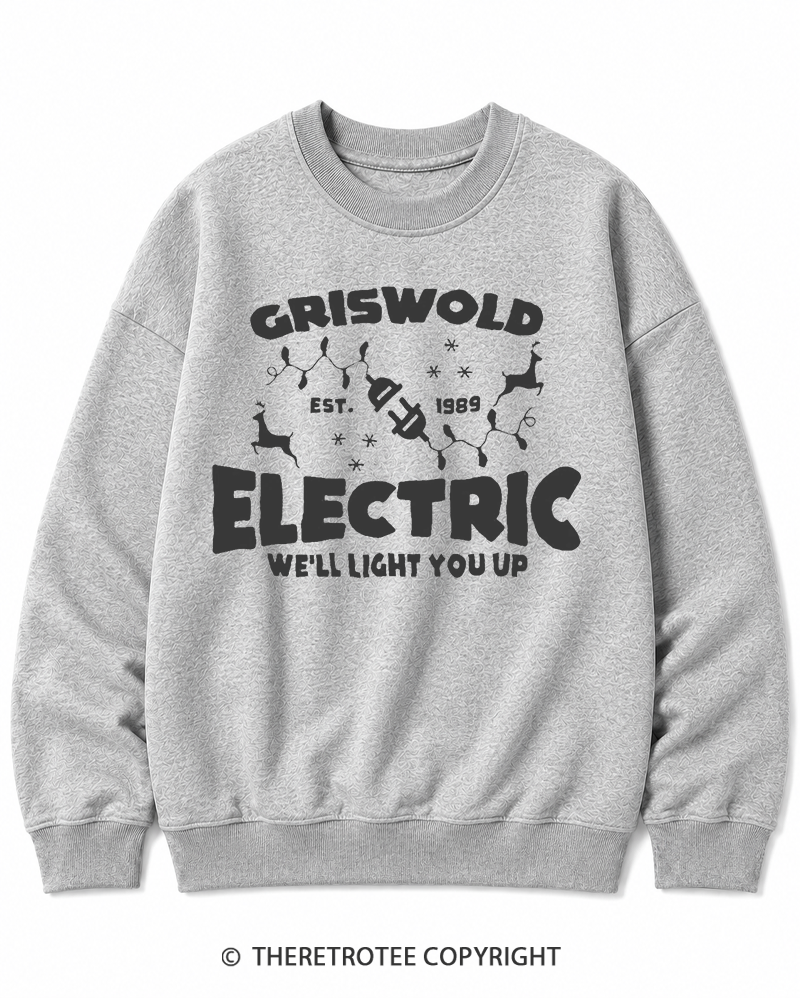 TheRetroTee We’ll Light You Up 1980s Christmas Cotton Sweatshirt