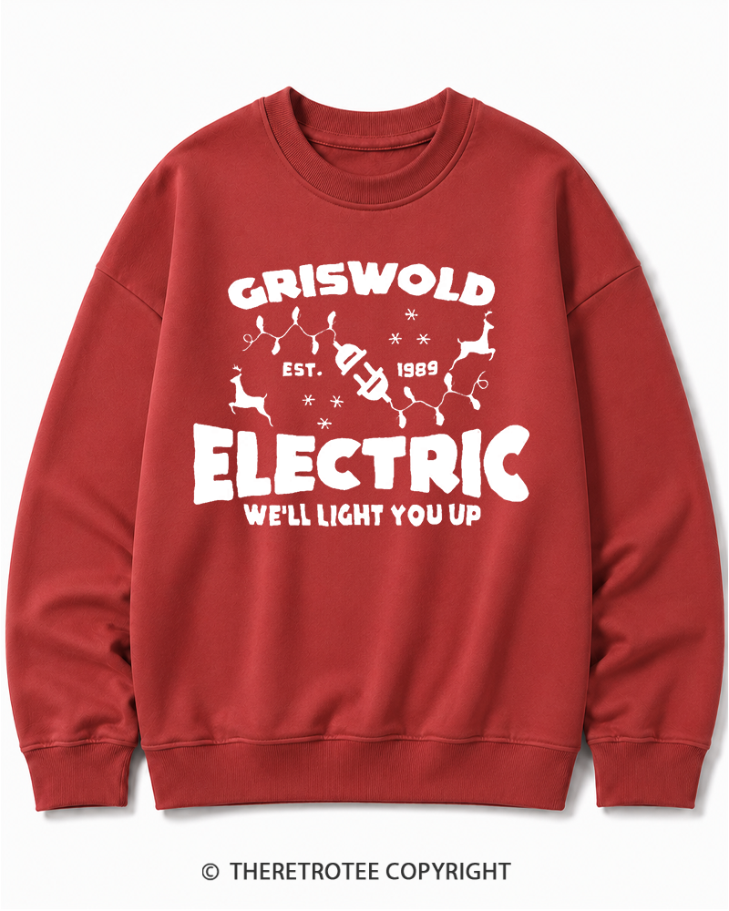 TheRetroTee We’ll Light You Up 1980s Christmas Cotton Sweatshirt