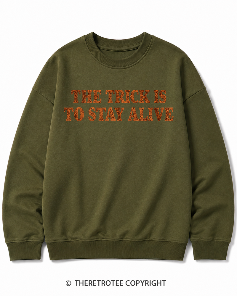 TheRetroTee The Trick Is To Stay Alive 1970s Halloween Halloween Cotton Sweatshirt