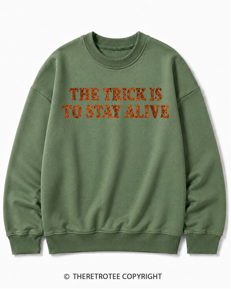 TheRetroTee The Trick Is To Stay Alive 1970s Halloween Halloween Cotton Sweatshirt