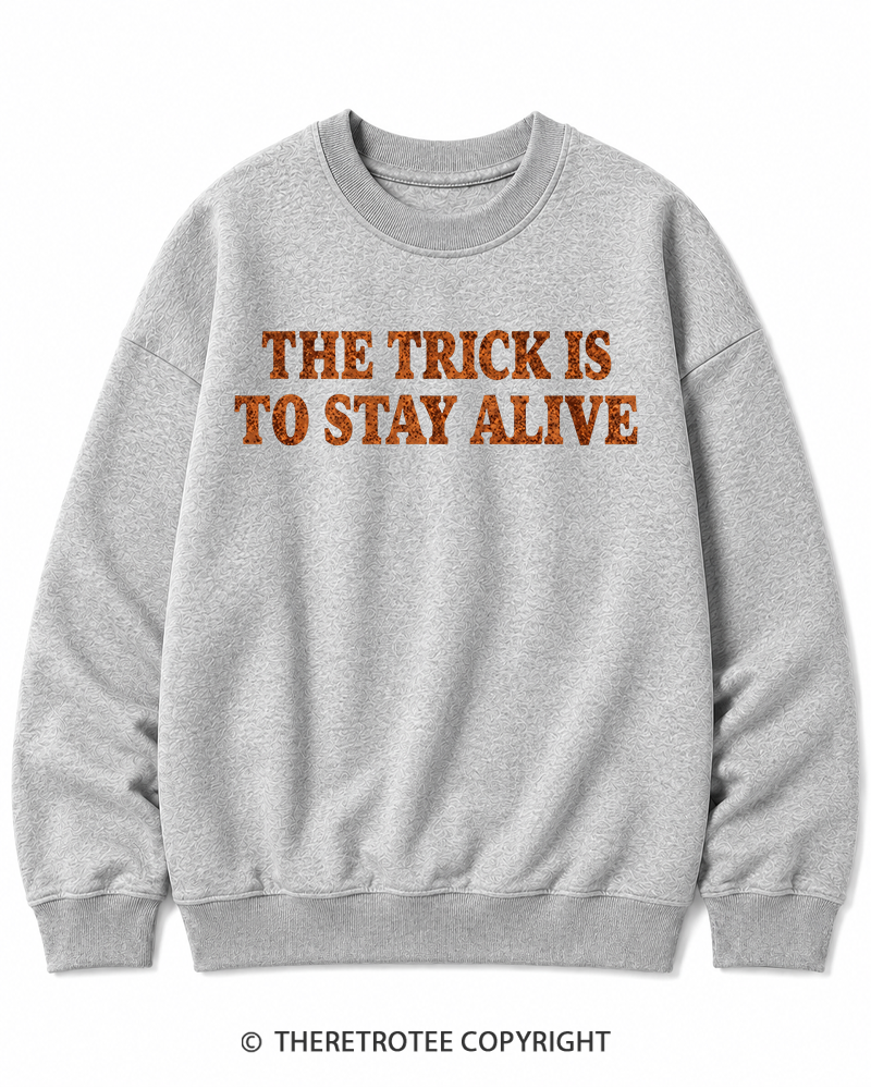 TheRetroTee The Trick Is To Stay Alive 1970s Halloween Halloween Cotton Sweatshirt