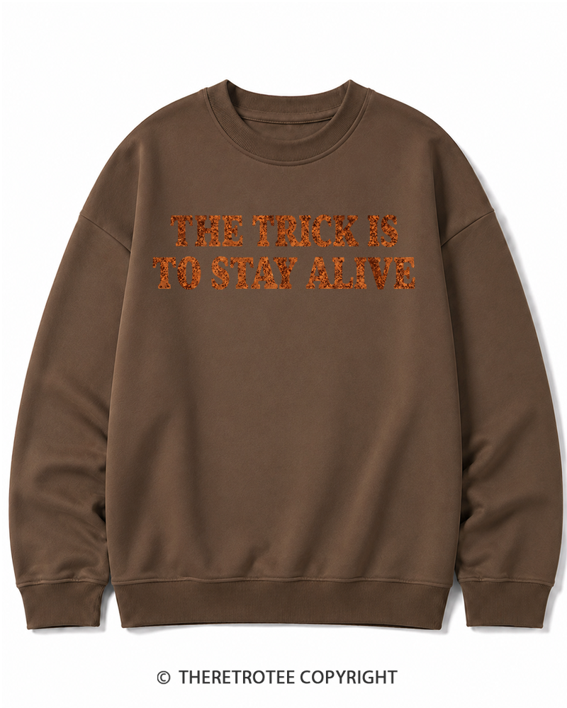 TheRetroTee The Trick Is To Stay Alive 1970s Halloween Halloween Cotton Sweatshirt