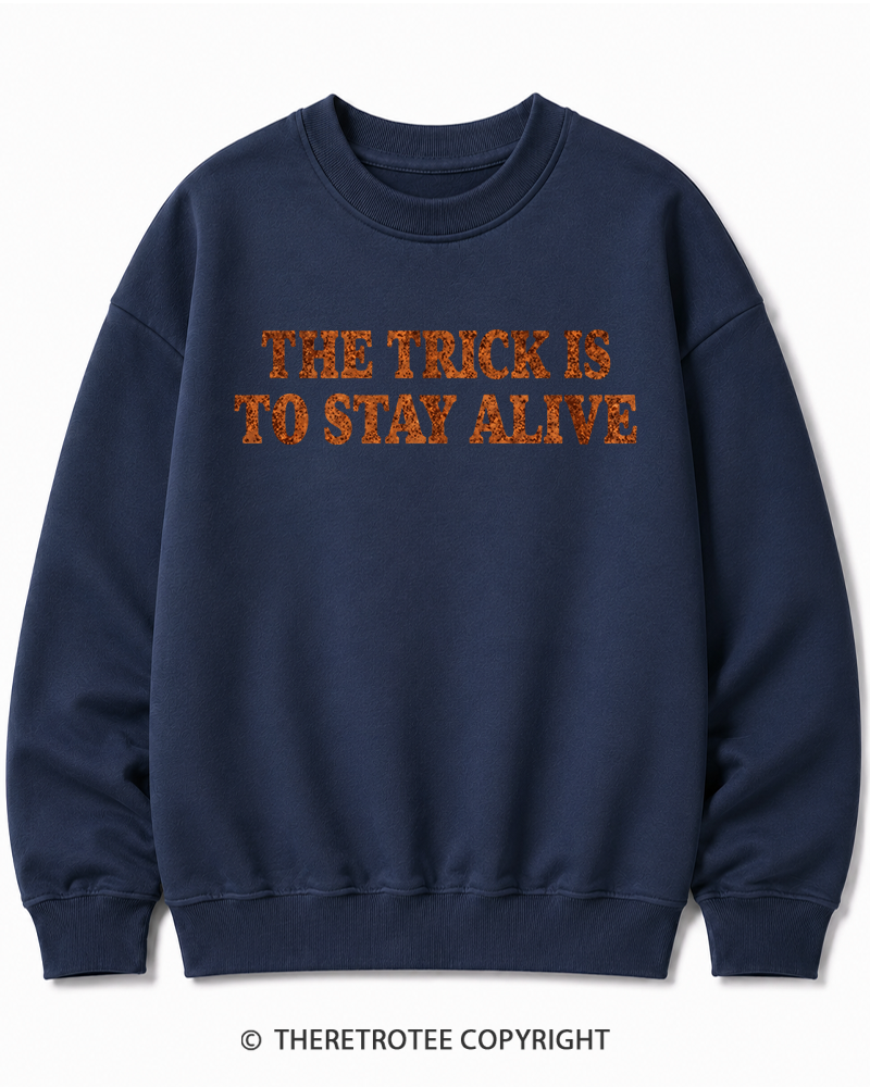 TheRetroTee The Trick Is To Stay Alive 1970s Halloween Halloween Cotton Sweatshirt