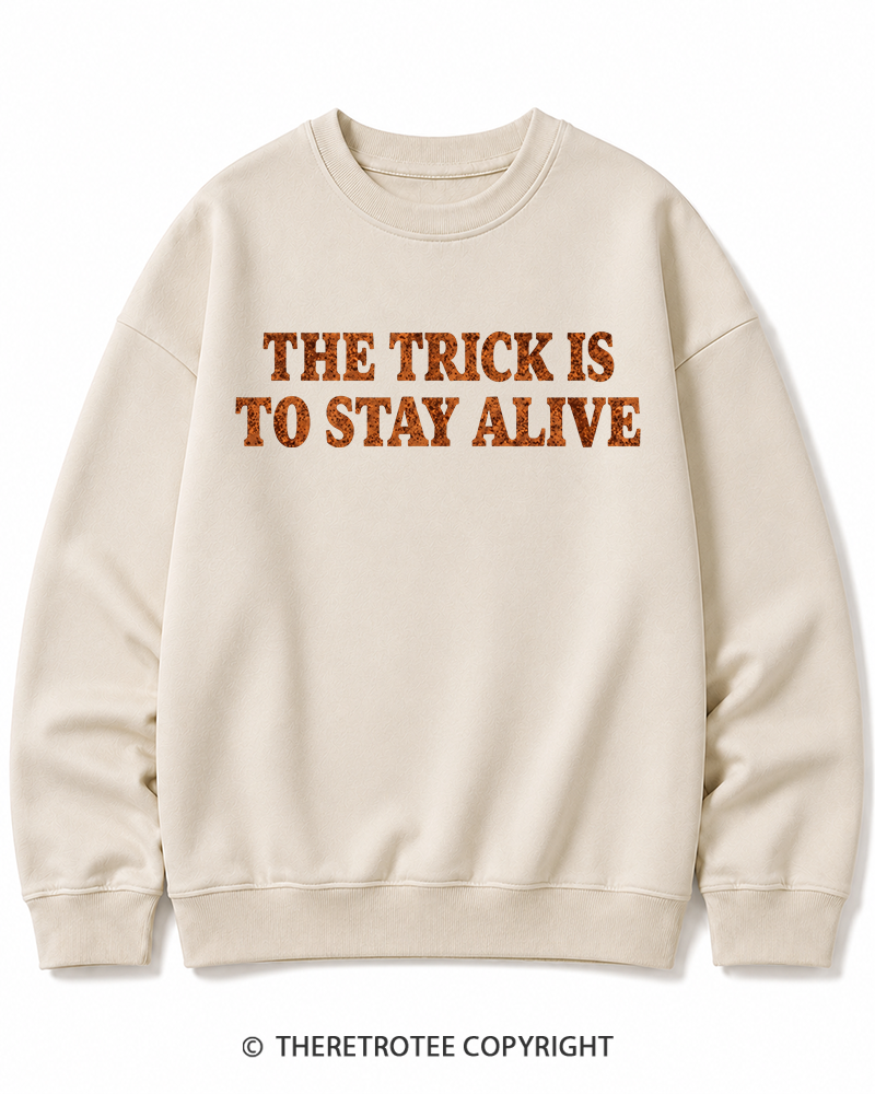 TheRetroTee The Trick Is To Stay Alive 1970s Halloween Halloween Cotton Sweatshirt