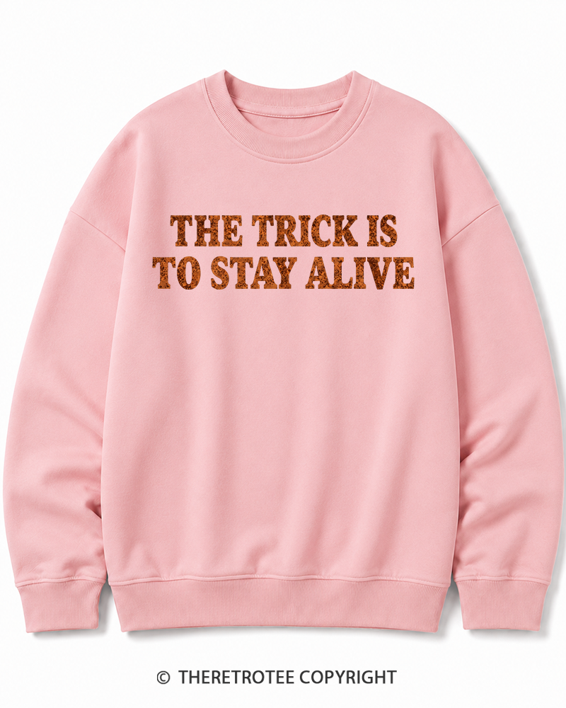 TheRetroTee The Trick Is To Stay Alive 1970s Halloween Halloween Cotton Sweatshirt