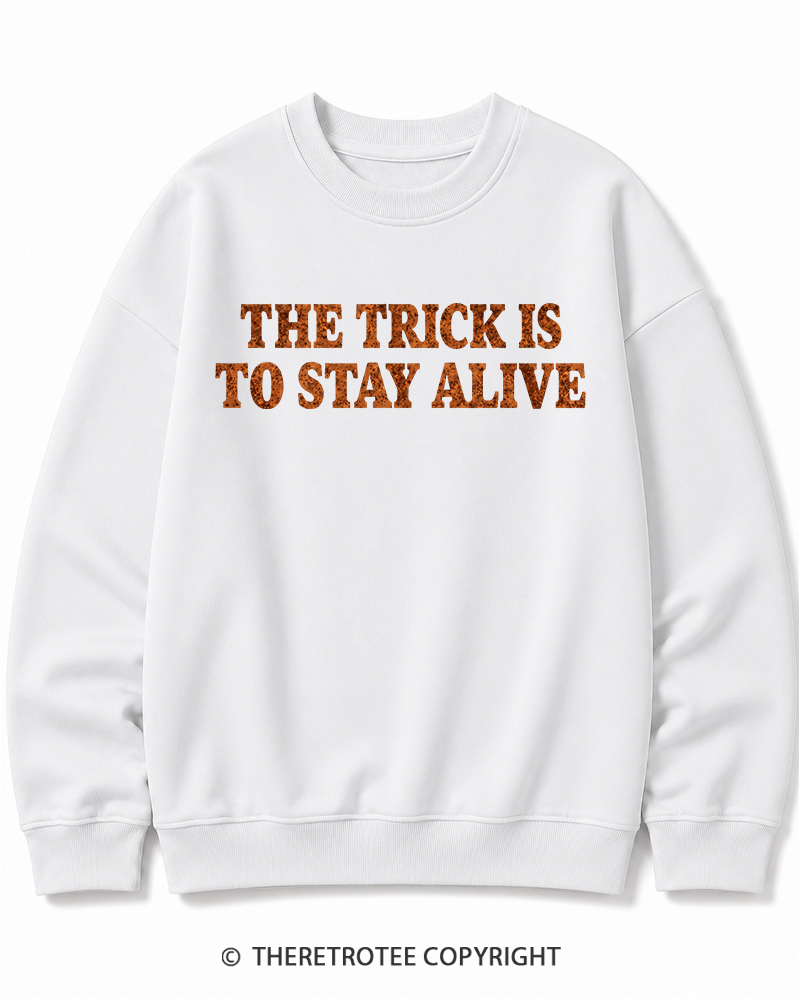 TheRetroTee The Trick Is To Stay Alive 1970s Halloween Halloween Cotton Sweatshirt