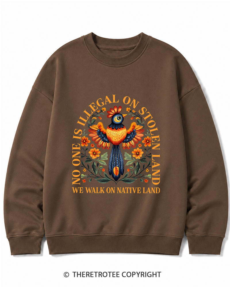 TheRetroTee No One Is Illegal On Stolen Land We Walk On Native Land Cotton Sweatshirt