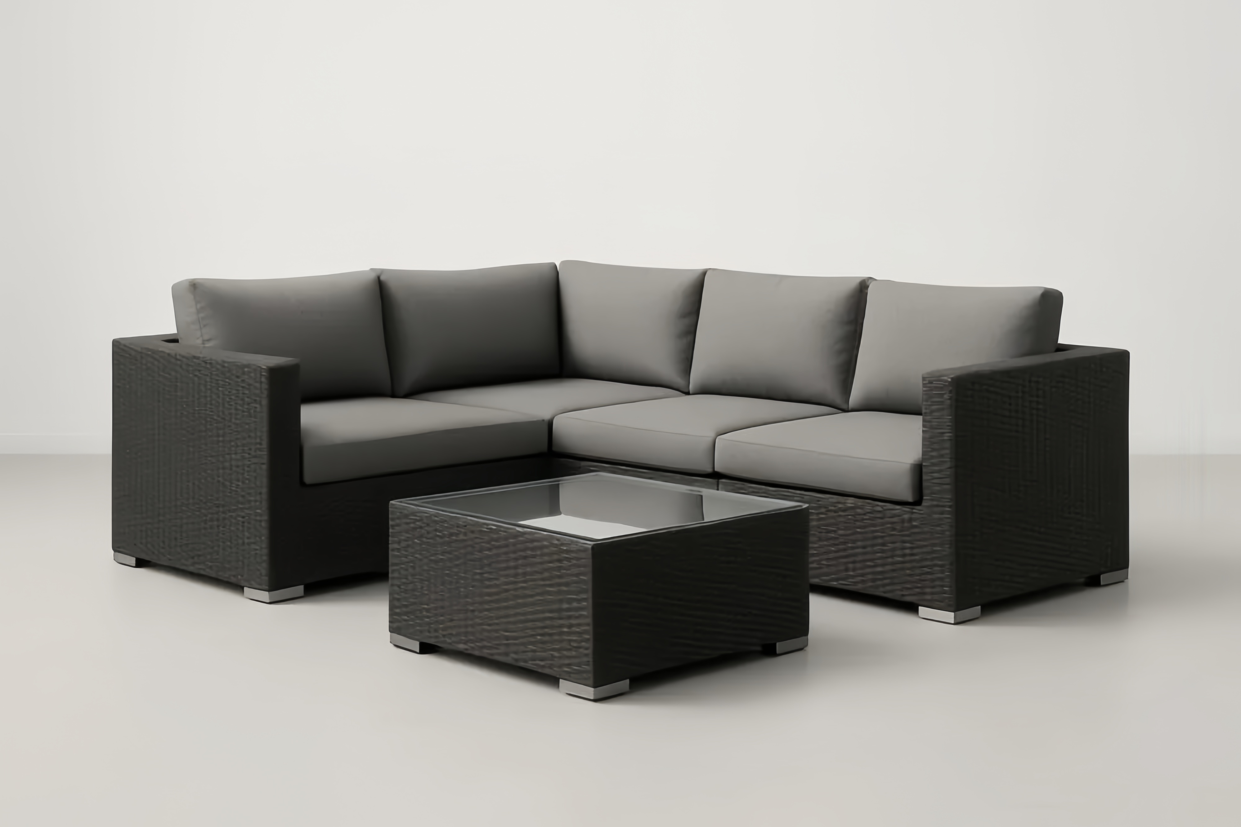 Divano Angolare in Rattan con Tavolino in Vetro Temperato