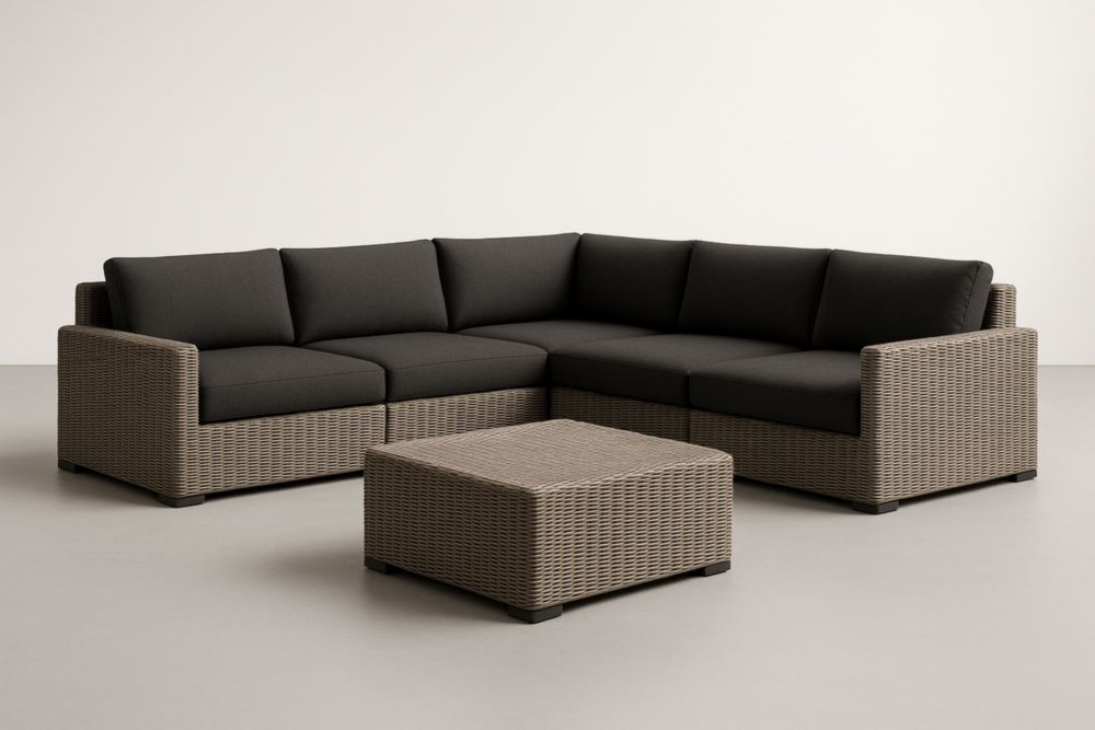 Divano angolare modulare in rattan sintetico grigio con cuscini neri