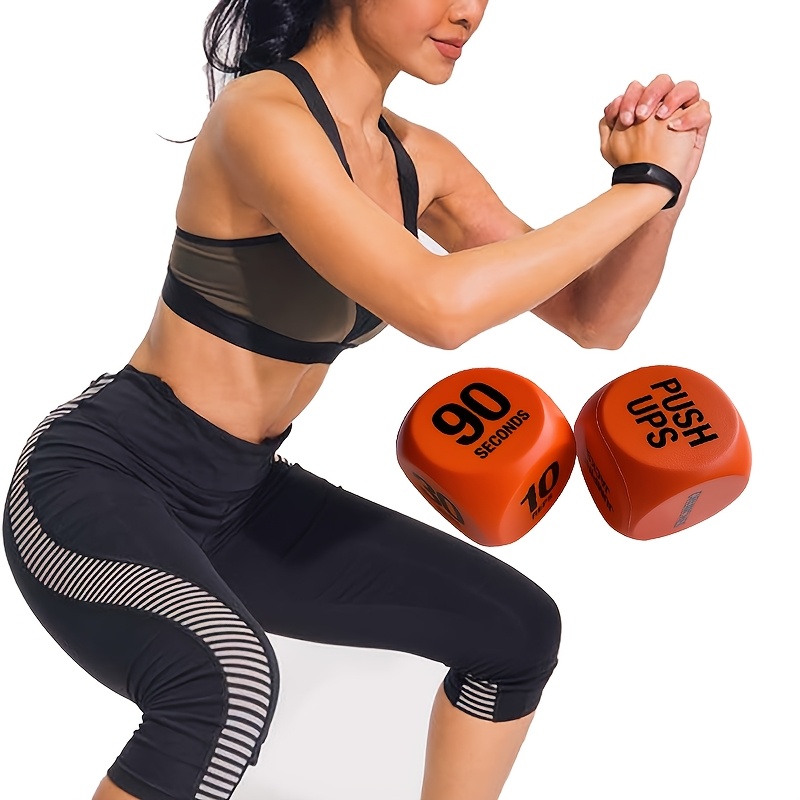 Two durable and fun fitness decision dice for physical training and exercise - colorful exercise balls with CRUNCHES and JUMPING text, perfect for h