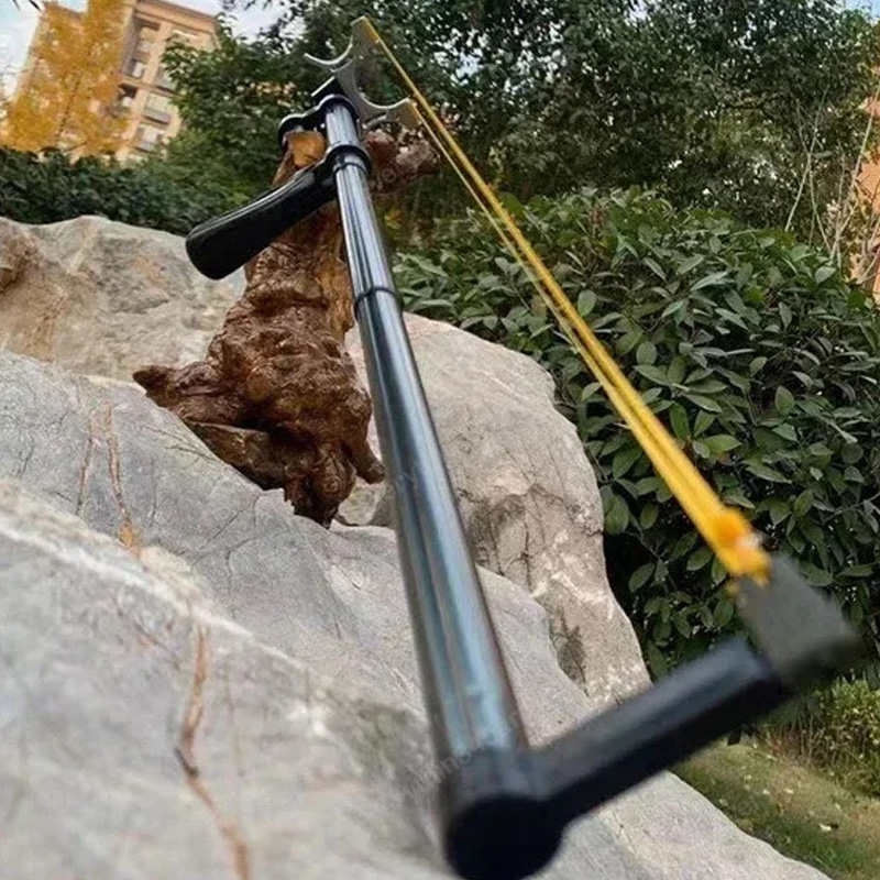 Laser-aimed telescopic slingshot