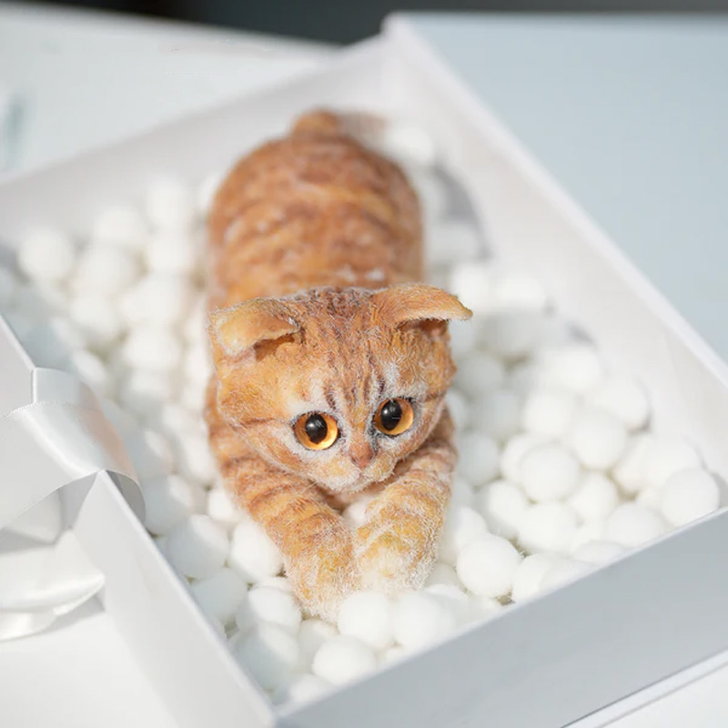 Simulated turmeric cat felt ornament