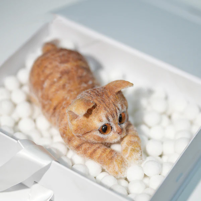 Simulated turmeric cat felt ornament