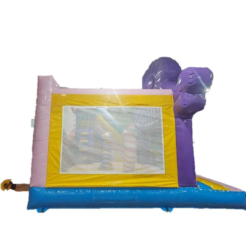 Candy-themed inflatable castle slide