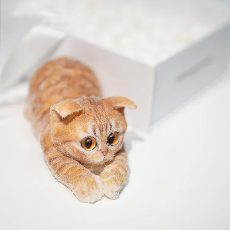 Simulated turmeric cat felt ornament