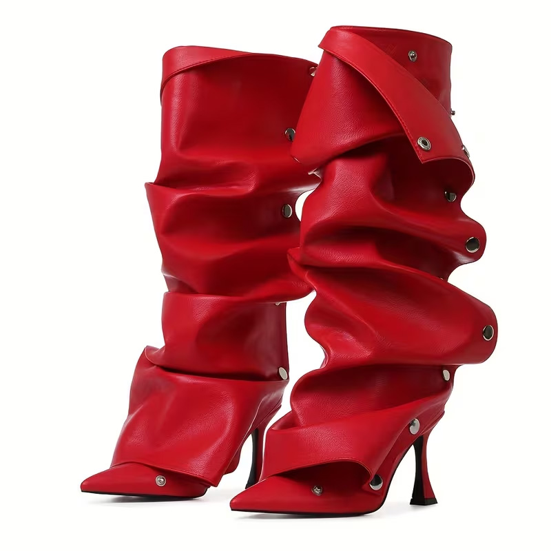 Pointed-toe, effortlessly chic knee-high heels