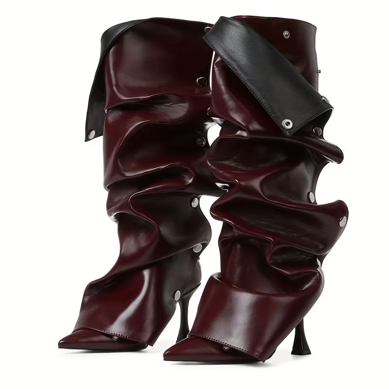 Pointed-toe, effortlessly chic knee-high heels