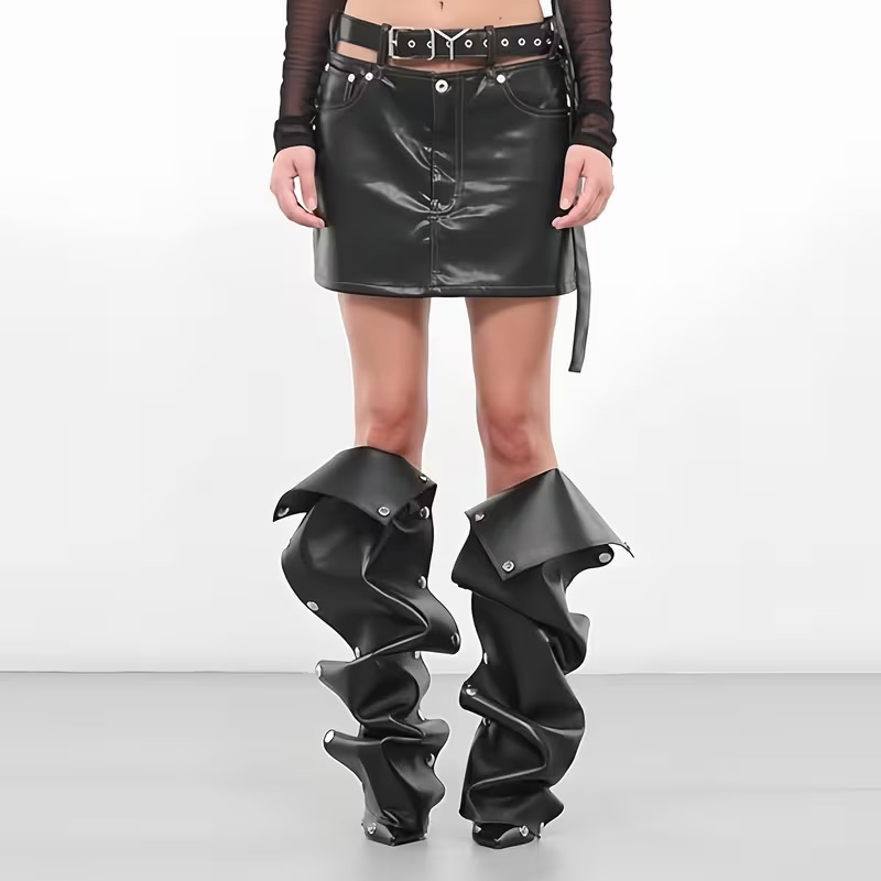 Pointed-toe, effortlessly chic knee-high heels