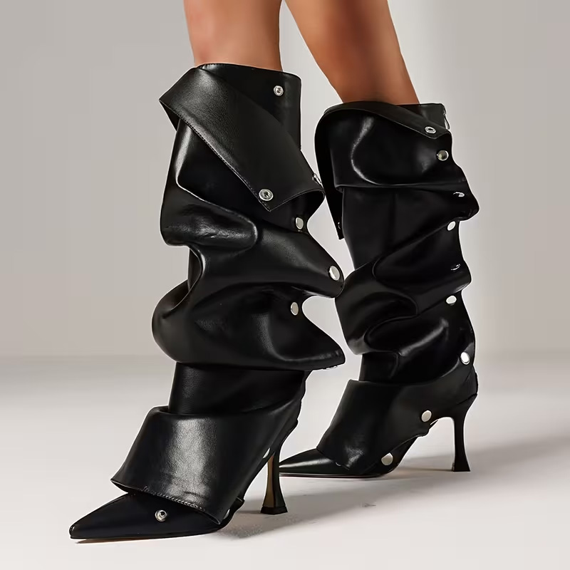 Pointed-toe, effortlessly chic knee-high heels